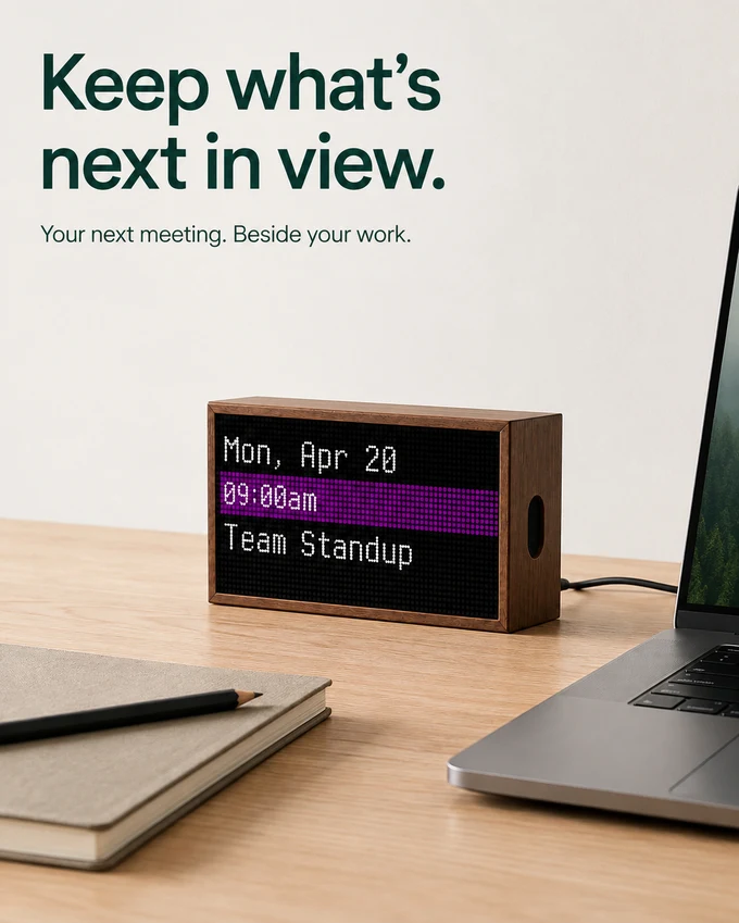 Keep what’s next in view: a meeting reminder beside your laptop