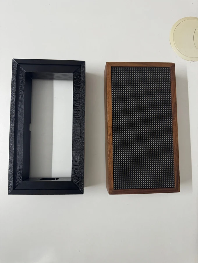 Final golden sample next to our first wooden prototype